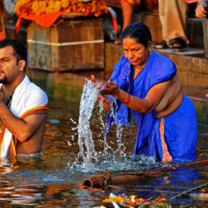 A dip in the holy waters of the river Ganges, Varanasi, India