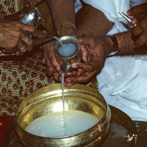 A religious rite being carried out at the Jain temple at Ranakpur, India
