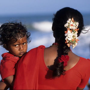 Mother and son at the beach, Mamallapuram, India